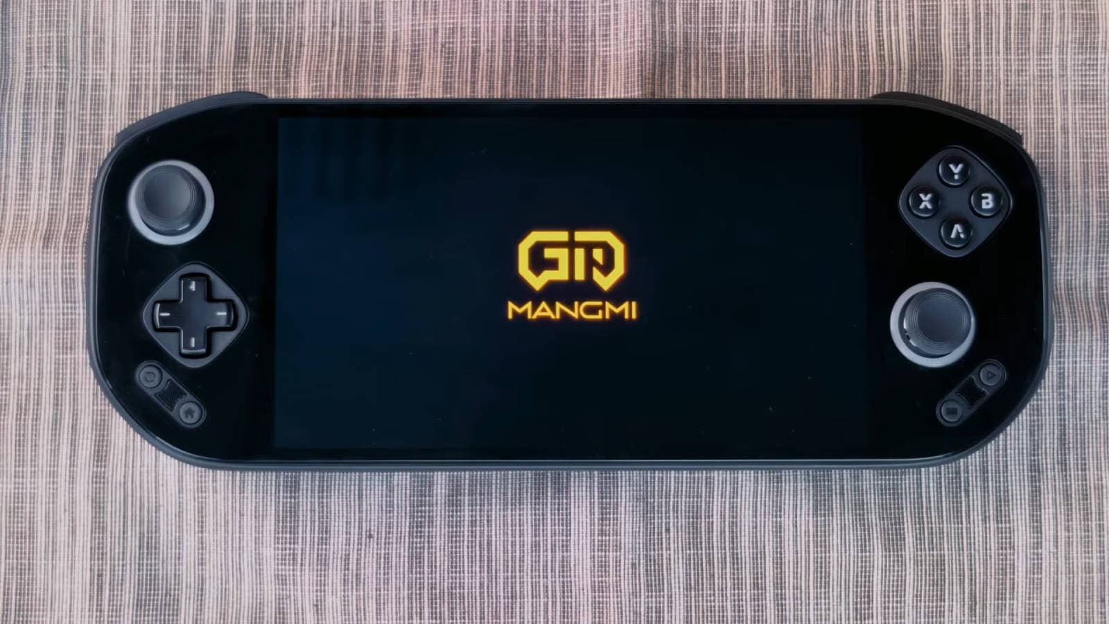 Портативная консоль Mangmi Pocket Max обзавелась ценой и датой старта предзаказа Геймерам удалось узнать за сколько можно будет купить портативную консоль Mangmi Pocket Max получившую чип Qualcomm Snapdragon 865 8 ГБ оперативной памяти и 7 дюймовый AMOLED дисплей с разрешением 1920 1080