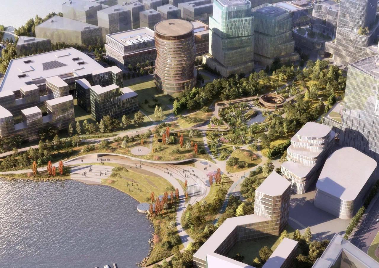 28 ноября в районе Москвы СберСити состоялась церемония заливки первого куба бетона для нового офиса Среднерусского банка Сбербанка Работы по строительству офисной башни площадью 40 685 кв м были официально запущены вице президентом и председателем банка Евгением Титовым и генеральным директором АО Рублево Архангельское проект СберСити Андреем Лихачевым Строение высота которого составит 80 метров будет выполнено в форме стилизованного столбца монет Строительство планируется завершить к III кварталу 2027 года Архитектурный проект включает 17 наземных и два подземных этажа а его эллиптическая форма со смещенными этажами создаст спиральный силуэт Панорамное остекление откроет вид на японский сад пруд и городской пейзаж Фасад с прозрачными элементами будет дополнен металлическими кольцами подчеркивающими спиральный дизайн РБК Отрасли