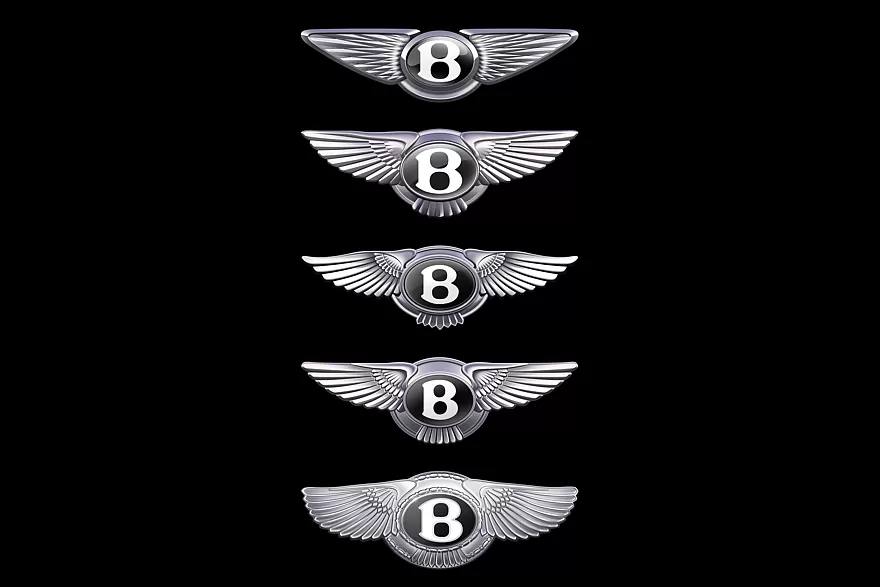 Bentley обновили эмблему — всего в четвёртый раз за 105 лет. Первый новый логотип примерит концепт-кар, который покажут 8 июля. Оригинальную эмблему с крылатой «B» в 1919 году придумал Ф. Гордон Кросби. Несимметричные крылья — с 13 и 14 перьями — были его способом защиты от подделок. Теперь символ меняется под руководством нового шеф-дизайнера Bentley Робина Пейджа, пришедшего из Volvo после ухода Андреаса Миндта в Volkswagen. Победивший вариант разработал дизайнер интерьеров Янг Нам — его идея обошла конкурентов внутри команды. Обновление приурочено к запуску трёхэтажной дизайн-студии Bentley в Крю. Новый логотип увидим уже на следующей неделе на программном концепте, который задаст тон будущим серийным моделям бренда. Пока Jaguar всё ещё отходит от провала с прошлогодним ребрендингом, в Bentley решили начать с небольших изменений.