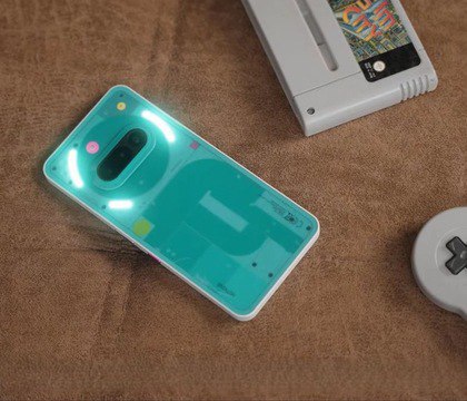 Представлен фанатский смартфон Nothing Phone 3a Community Edition в ретро дизайне Nothing представила Nothing Phone 3a Community Edition специальную версию своего смартфона созданную при участии фанатов бренда Технически аппарат остался тем же Главное отличие от обычного Phone 3a бирюзовая расцветка корпуса с розовыми и желтыми акцентами