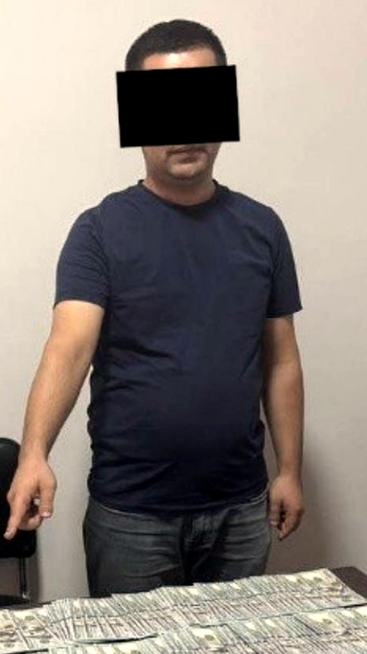 В Фергане задержан налоговик за коррупцию на 30 тысяч долларов