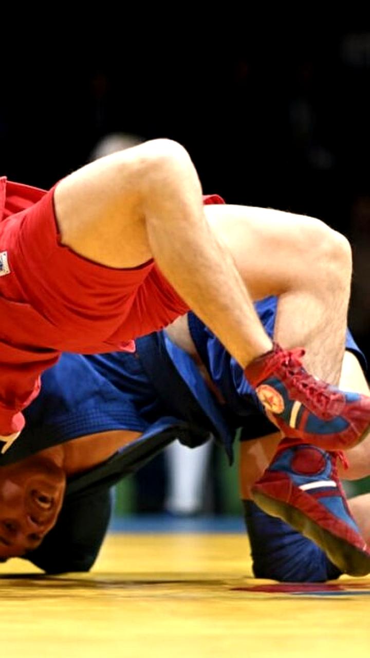 Российские и белорусские спортсмены смогут выступать под национальными флагами с 2026 года